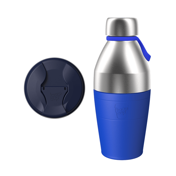 KeepCup Just Essentials Electric featuring a stainless steel thermal bottle with bright blue silicone band and carry loop, shown alongside its navy blue sipper lid, displayed against a white background.