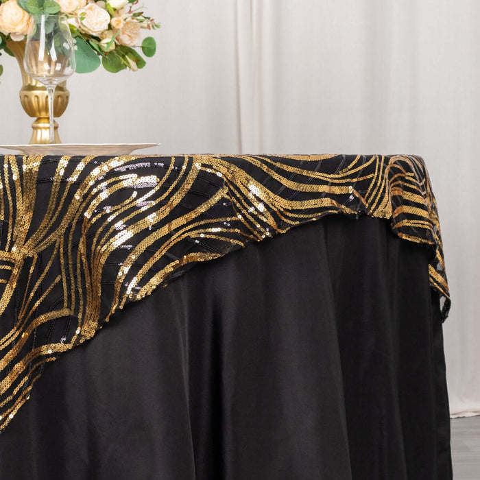 Black tablecloth with gold sequin design, elegantly draped for an event setting.