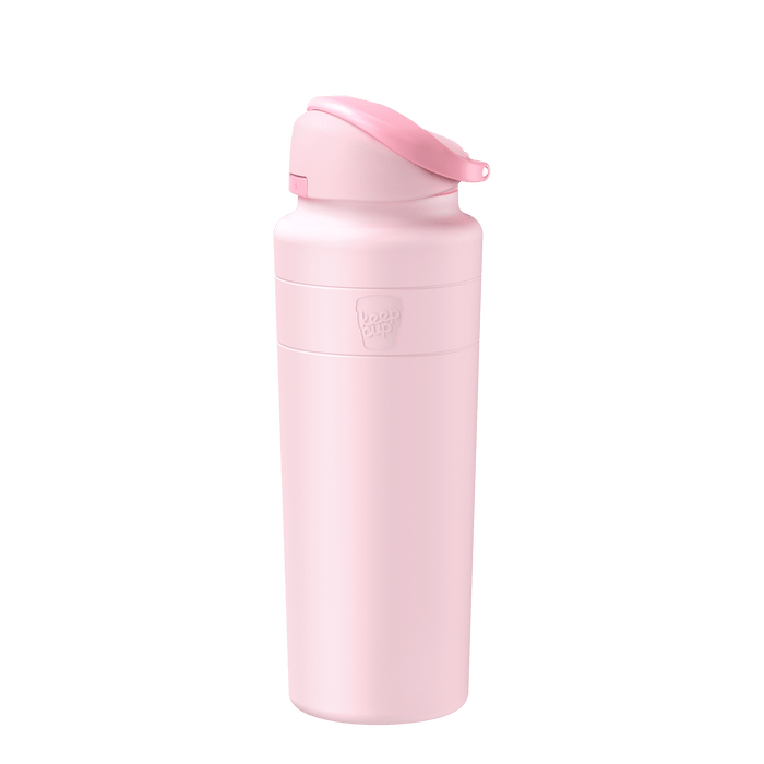 KeepCup Ora Bottle 700ml in Pashmak Pink, shown at a slight angle against a white background, featuring a flip-top lid and the embossed KeepCup logo on the matte pastel pink body.