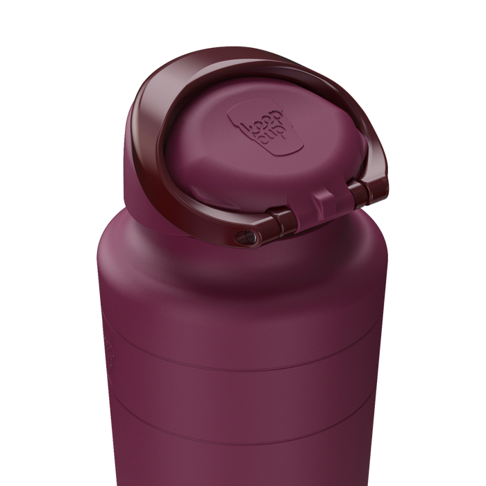 Close-up of the Ora Bottle 700ml in Mulberry, showing the flip-top lid open with the KeepCup logo embossed on the cap, highlighting the deep burgundy colour and matte finish of the insulated bottle.