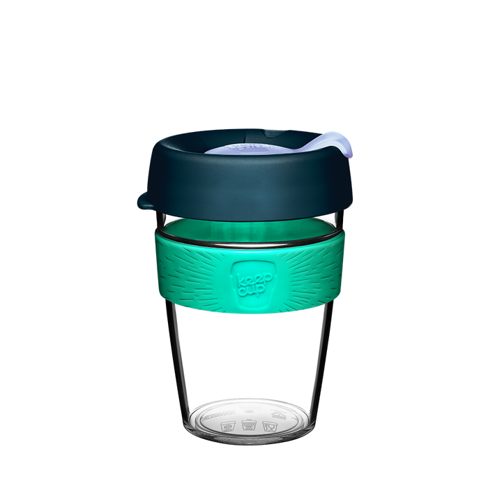 KeepCup Original Clear M 12oz in Eventide, featuring a clear plastic cup with a teal silicone band embossed with the KeepCup logo, and a dark charcoal lid with a light-coloured sipper plug, shown against a white background.