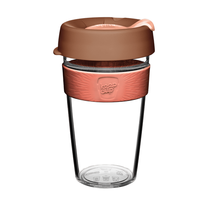 KeepCup Original Clear L 16oz in Frappe, featuring a clear plastic cup with a coral-coloured silicone band and brown lid with peach plug, shown on a white background.