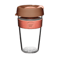 KeepCup Original Clear L 16oz in Frappe, featuring a clear plastic cup with a coral-coloured silicone band and brown lid with peach plug, shown on a white background.