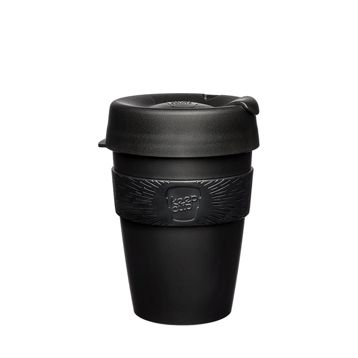 KeepCup Original M 12oz in Black, shown in a front-facing product shot against a white background, featuring the signature black silicone band with embossed KeepCup logo and matching black lid with sipper closure.