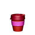 KeepCup Original S 8oz in Daybreak, featuring a red-orange cup body, pink silicone band with embossed KeepCup logo, and dark red lid with sipper closure, shown against a white background.
