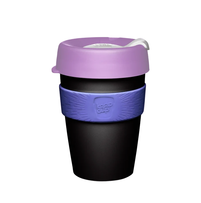 KeepCup Original M 12oz in Mallow, featuring a black reusable cup with a lavender lid and purple silicone band, shown against a plain white background.