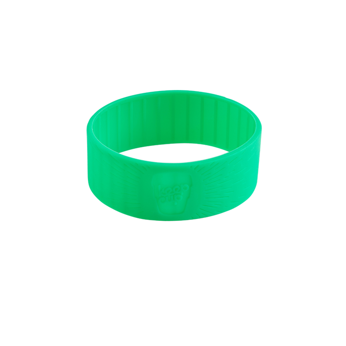 Green KeepCup Silicone Band shown at a three-quarter angle against a white background, featuring a subtle embossed logo design with radiating lines on the outer surface.
