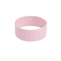 Pashmak pink silicone band for KeepCup shown at a slight angle on a white background, featuring the embossed KeepCup logo and radiating line texture on the exterior with vertical ridges on the interior for grip.