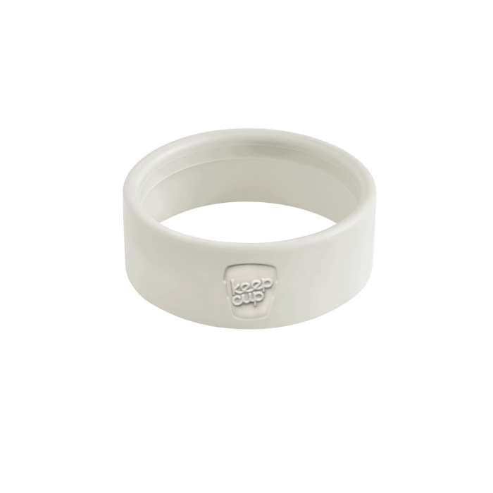 Silicone Band Longplay in Chalk, a soft white circular band shown at a slight angle against a plain background, featuring an embossed KeepCup logo on the front.