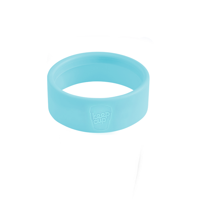 Silicone Band Longplay in Cloud, a light blue flexible ring shown at a slight angle against a white background, featuring an embossed KeepCup logo on the front.