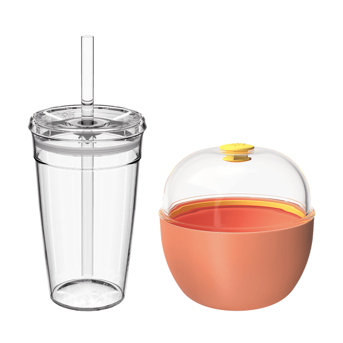 KeepCup Sip and Snack in Clay, showing two components side by side: a clear reusable tumbler with straw and lid on the left, and a round coral-coloured snack container with transparent domed lid and yellow vent button on the right.