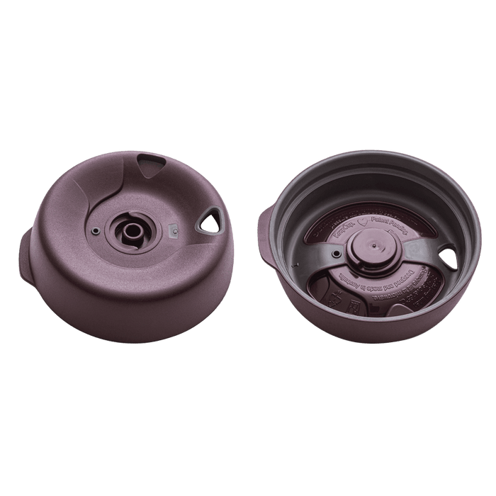 KeepCup Splashproof Lid Base in Blackberry colour shown from two angles: exterior view displaying the drinking spout and plug hole, and interior view revealing the valve mechanism and embossed branding, designed to fit Brew XS cups.