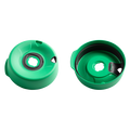 Splashproof Lid Base in Emerald shown from two angles: the top view displaying the central drinking hole with grey silicone seal and triangular vent, and the underside view revealing the inner construction and moulded text details.