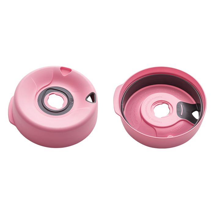 KeepCup Splashproof Lid Base in Peony pink, shown from two angles: top view displaying the circular lid with central drinking hole and air vent, and underside view revealing the internal sealing mechanism and embossed text indicating it is designed and made in Australia.