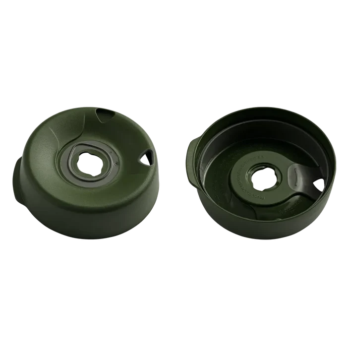 KeepCup Splashproof Lid Base in Pine shown from two angles: the domed top view displaying the central opening and ventilation holes, and the underside view revealing the internal structure and hexagonal fitting.