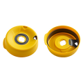 KeepCup Splashproof Lid Base in Yellow Bird, shown from two angles: the top view displaying the central drinking hole with grey silicone seal, and the underside view revealing the internal mechanism and curved splash guard.
