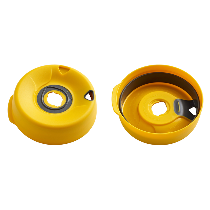 KeepCup Splashproof Lid Base in Yellow Bird, shown from two angles: the top view displaying the central drinking hole with grey silicone seal, and the underside view revealing the internal mechanism and curved splash guard.