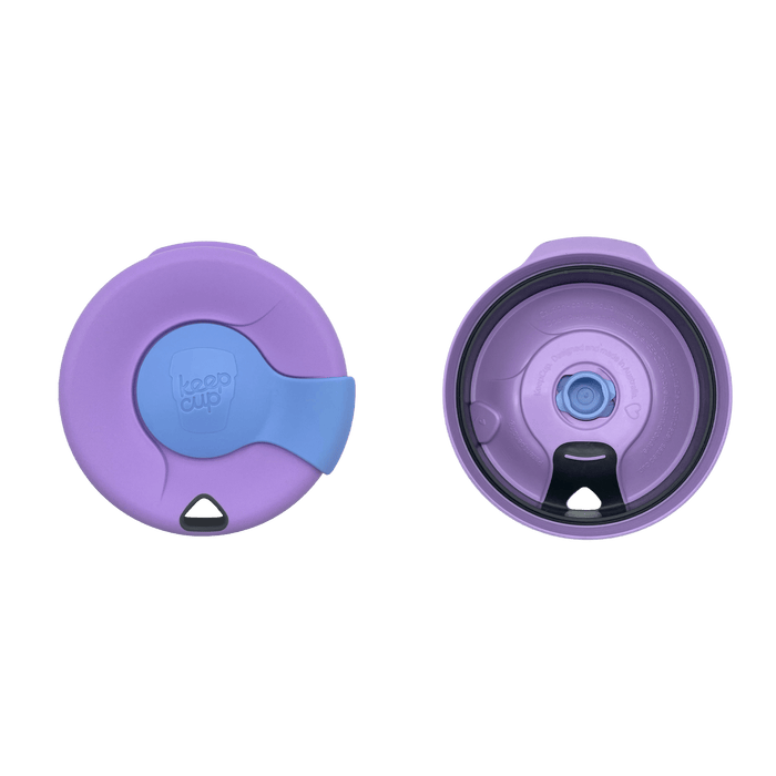 Top-down view of the KeepCup Splashproof Lid in Moonlight, showing both the exterior with lavender and blue sipper plug, and the interior with seal ring and drinking spout mechanism.