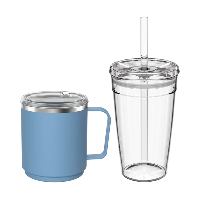 KeepCup Urban Adventurer set in Mist colourway featuring a blue insulated mug with handle and clear lid alongside a clear double-walled tumbler with straw, both shown on a white background.